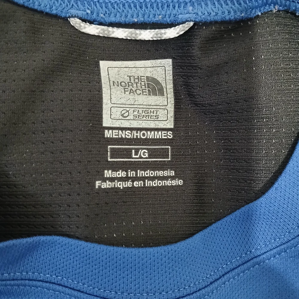 The North Face Blue and Black Athletic Shirt